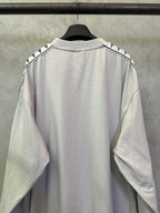 Balenciaga long-sleeve crewneck shirt, light off-white, back view with sleeve logo