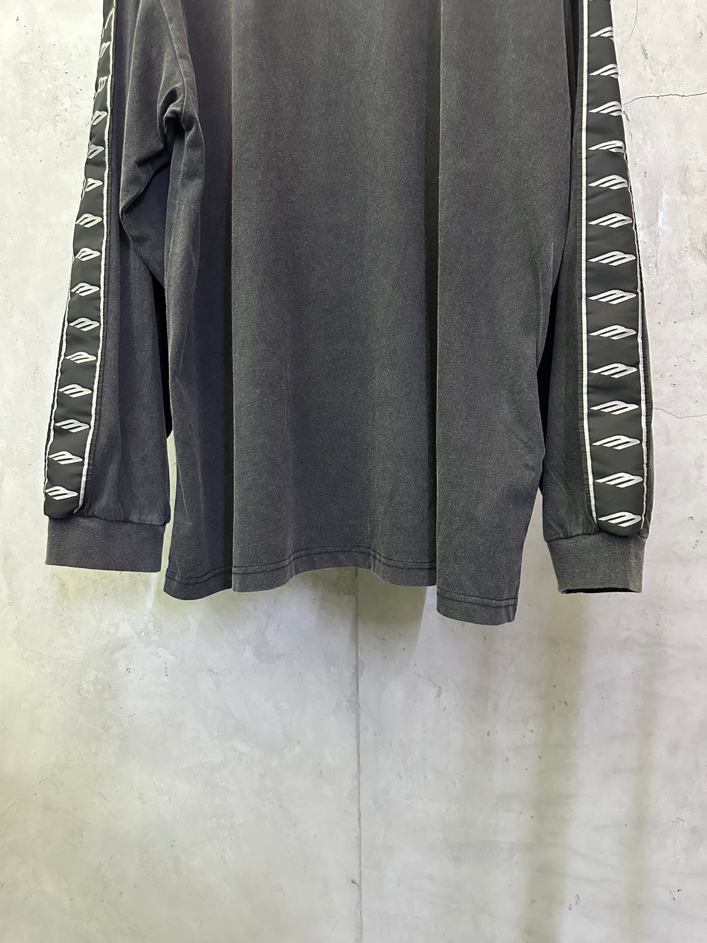 Balenciaga long-sleeve shirt in dark gray with curved hem and white logo tape sleeve panels