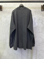 Balenciaga long-sleeve shirt, dark gray back view with white logo tape at cuffs