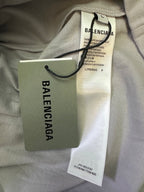 T-shirt hang tags with Balenciaga logo on paper tag and size label