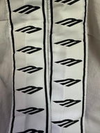 Balenciaga T-shirt sleeve with repeating black geometric logo band