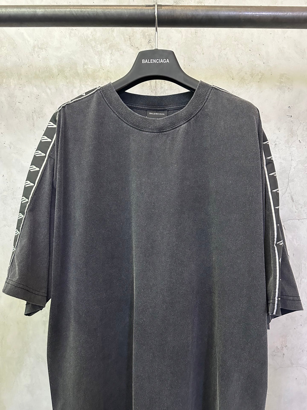 Men's black crew-neck T-shirt, white graphic tape on both sleeves