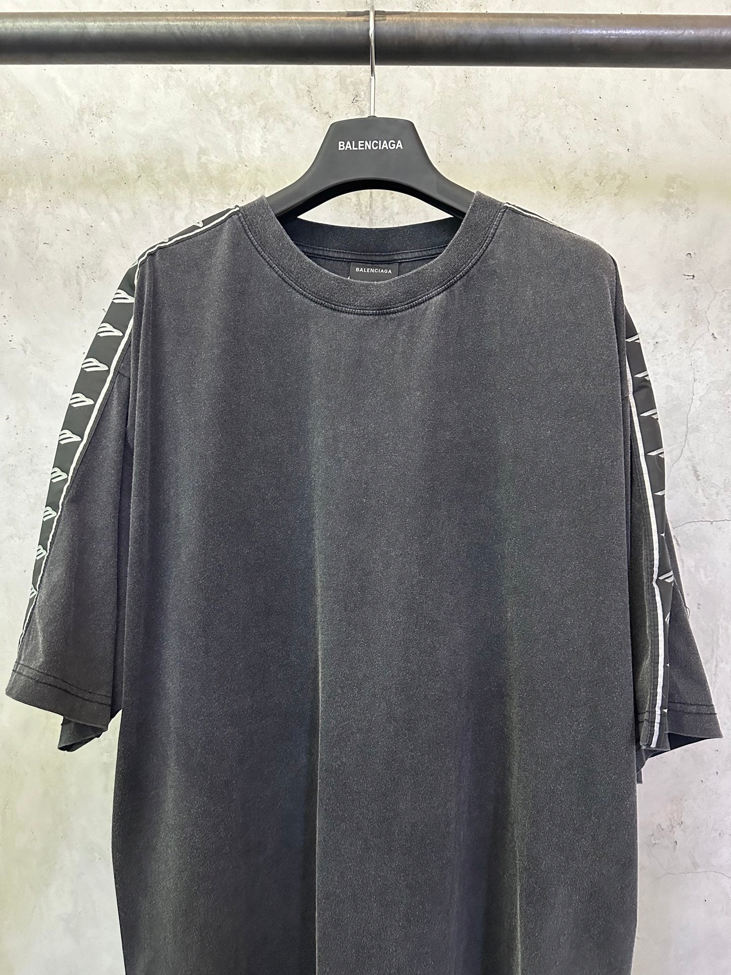 Men's black crew-neck T-shirt, white graphic tape on both sleeves