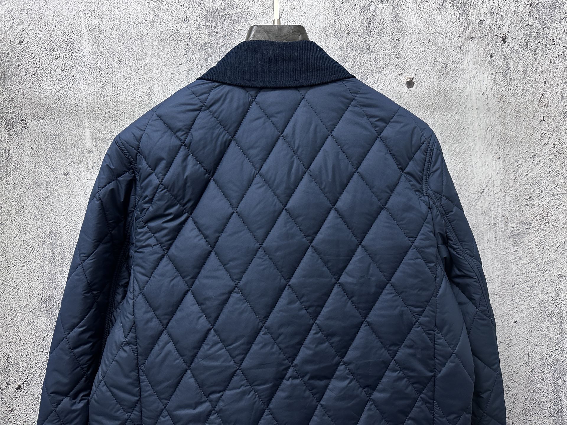 Ralph Lauren quilted jacket, navy blue, back view with diamond stitching and stand collar