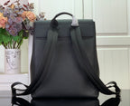 Louis Vuitton backpack with flap top and two adjustable shoulder straps, dark textured leather