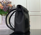 Louis Vuitton backpack angled view with front flap, side pocket, and adjustable shoulder straps