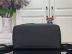 Louis Vuitton zip-top backpack in dark pebbled leather with wide front flap detail