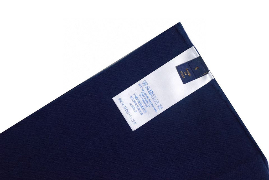 Louis Vuitton short-sleeve T-shirt close-up of brand label at hem