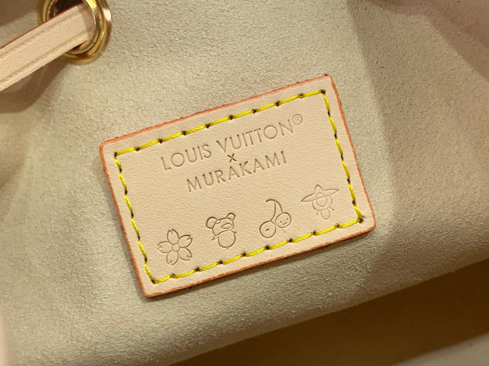 Louis Vuitton x Murakami leather patch with logo and small flower icons