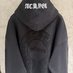 Black hoodie back with hood and white stylized text, featuring a large oval logo