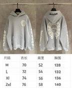 Gray hoodies on hangers, front and back views with circular emblem graphics.