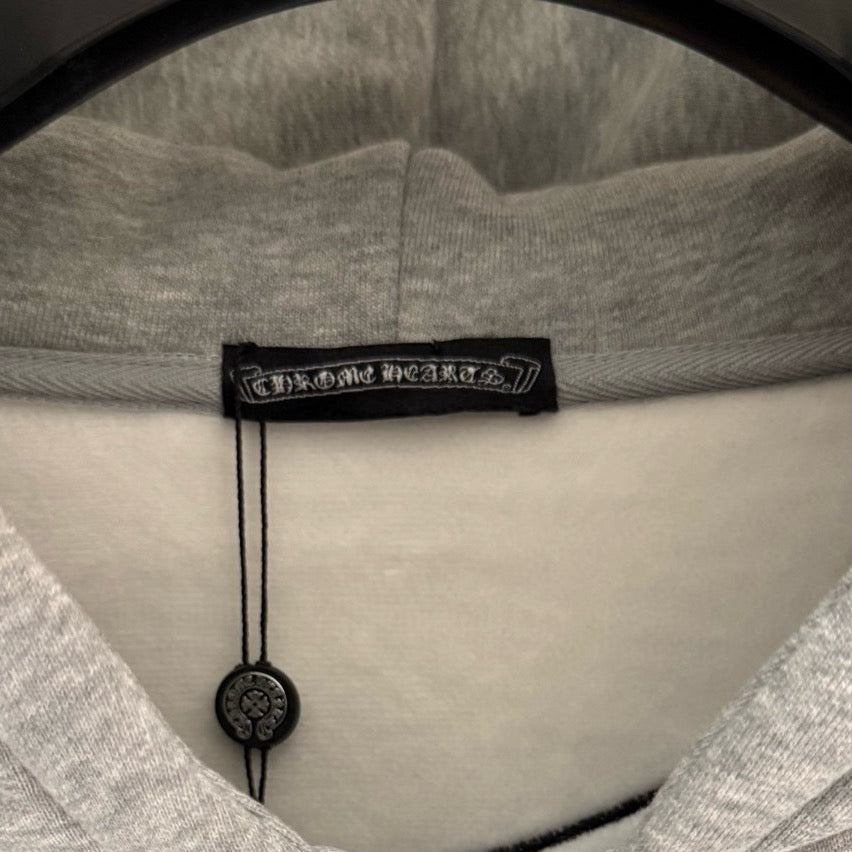 Hoodie neckline with interior brand label and stitch detail.