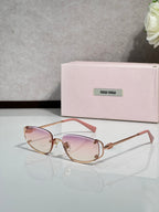MiuMiu eyeglasses with pink tinted lenses and rose-gold round frames