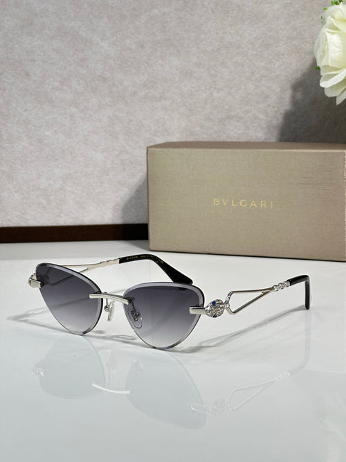 Gold-frame sunglasses with dark blue gradient lenses, front angle view