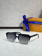 Sunglasses with black frames and monogram-patterned dark tinted lenses