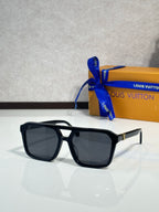 Sunglasses with black square frames and dark tinted lenses