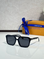 Louis Vuitton sunglasses with black square frames and dark tinted lenses