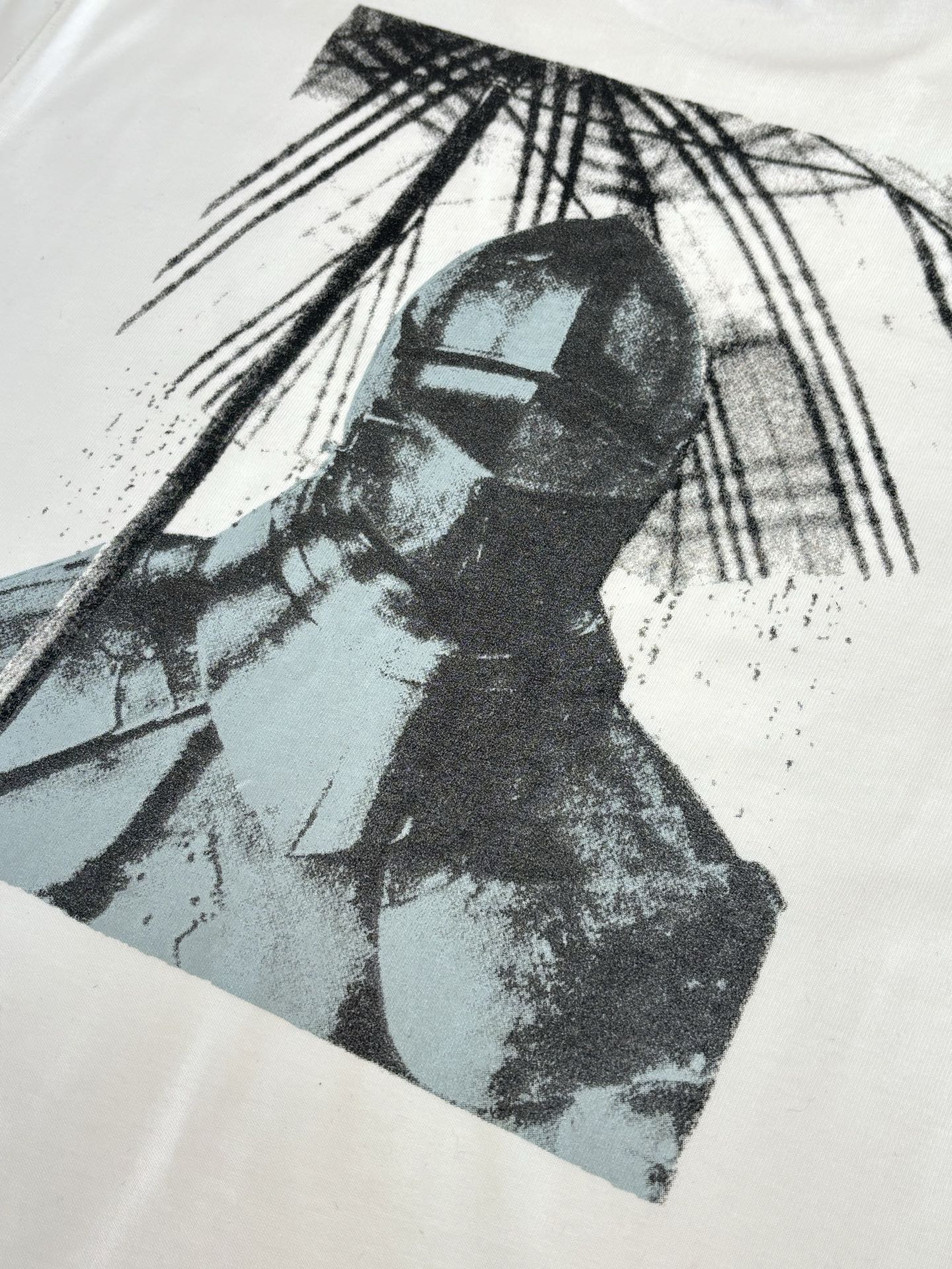 Burberry white T-shirt close-up of black and blue graphic print