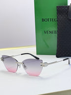 Bottega Veneta sunglasses with gradient silver-gray lenses, gray frame and black temple tips
