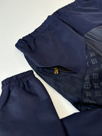 Navy jacket and pants set; elastic waist pants with cuffed leg openings