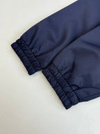 Navy long pants with gathered elastic cuffs