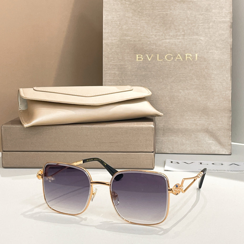 Bvlgari sunglasses with dark blue lenses and gold frame, square style