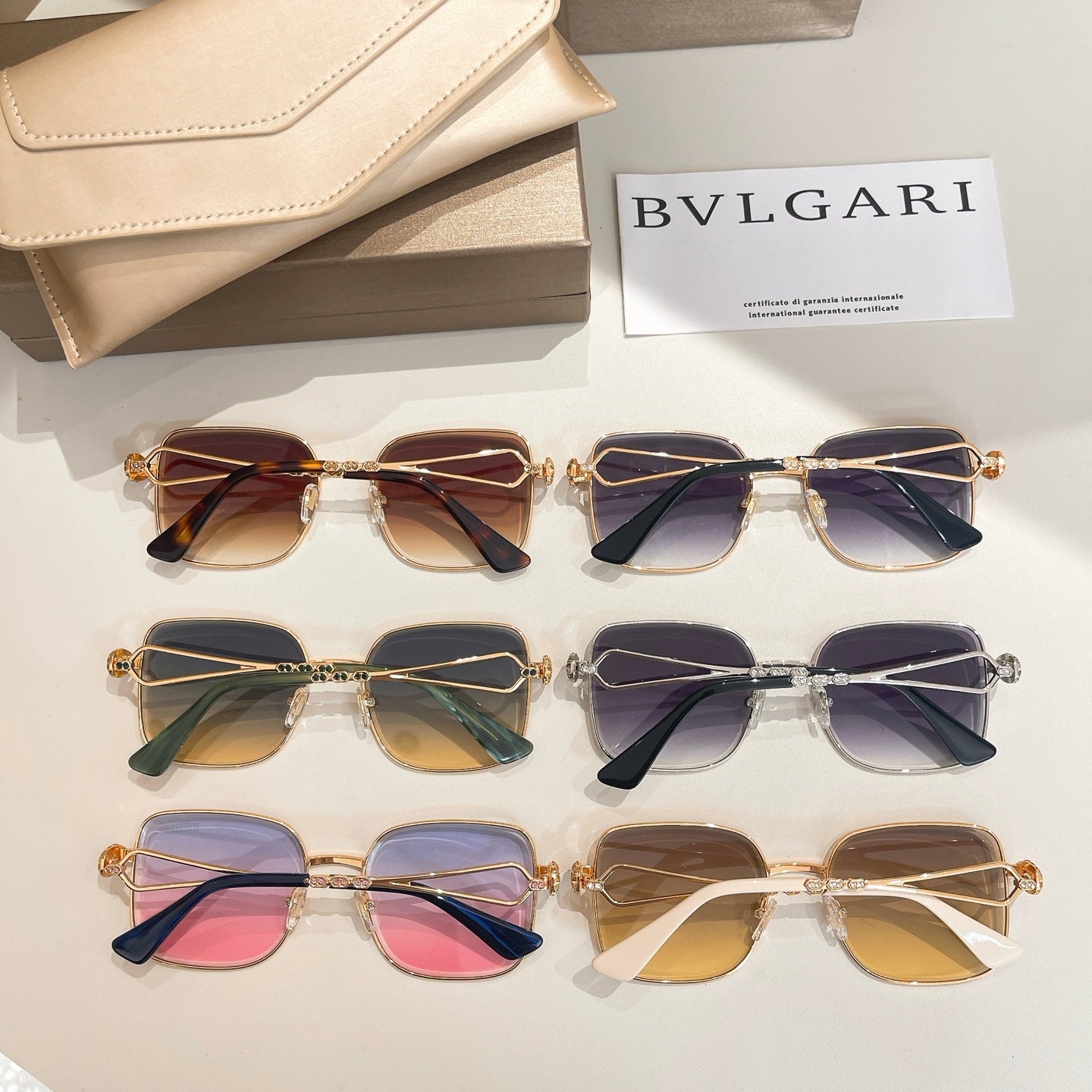 Bvlgari sunglasses collection: mixed frames with tinted lenses and gold details