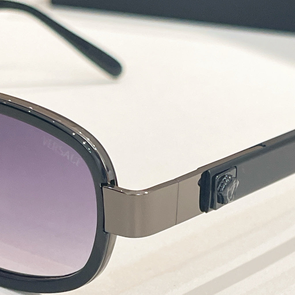 Versace sunglasses side arm and lens edge, dark frames