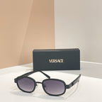 Versace sunglasses, black round frames with purple-tinted lenses