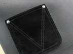 Louis Vuitton bag interior pocket close-up in black leather with stitched edges