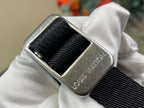 Louis Vuitton bag metal logo plate on black leather strap