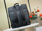 Louis Vuitton bag back view with multiple side straps and adjustable top closure