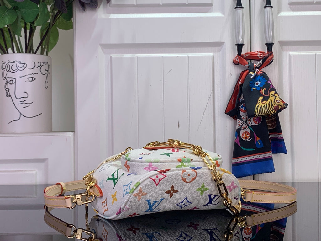 Designer top-handle bag, white with multicolor monogram pattern, gold strap hardware