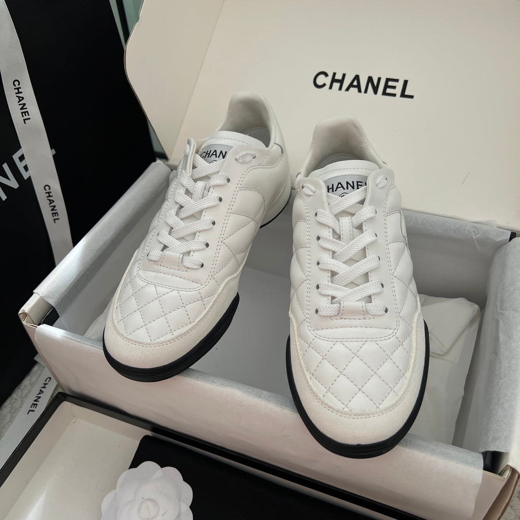 Chanel unisex sneakers, white leather upper with quilted pattern and white laces