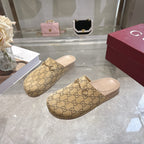 Gucci GG slide sandals, beige patterned mule-style with light beige insole and front bar strap