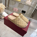 Gucci slide sandals in beige GG monogram canvas with light pink footbeds and straps