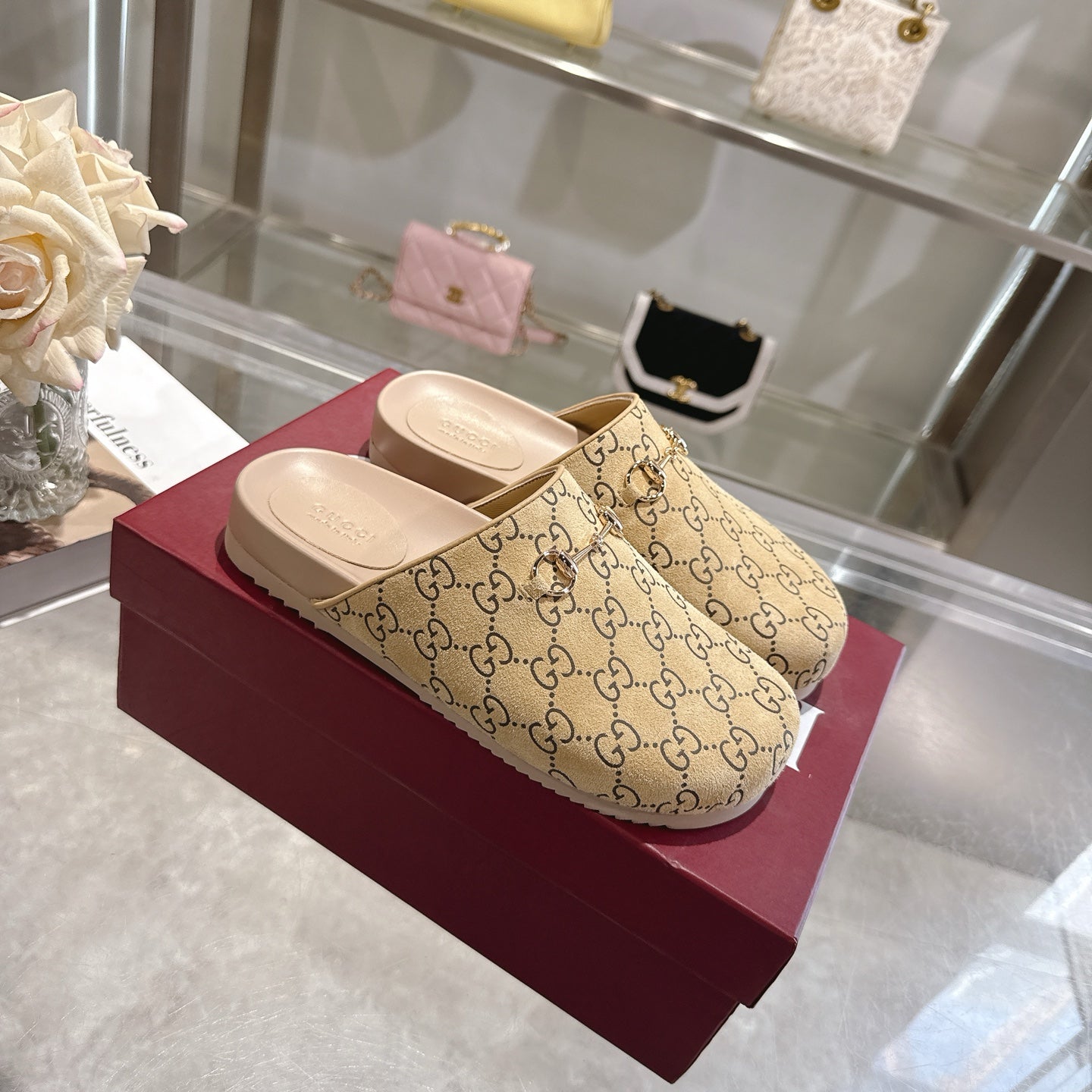 Gucci slide sandals in beige GG monogram canvas with light pink footbeds and straps