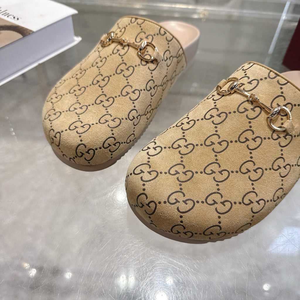 Gucci GG slide sandals, beige logo canvas with metallic chain detail on upper