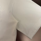 White short-sleeve T-shirt with smooth fabric and stitched sleeve opening