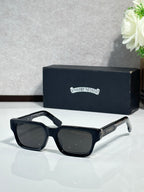 Black rectangular eyeglasses with dark lenses and metal temple detailing