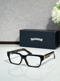 Black rectangular eyeglasses with clear lenses and thin metal temple detailing