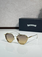 Chrome glasses with amber lenses and metal frame, round oversized shape