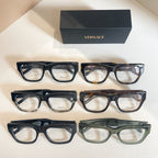 Three-pair eyeglasses set with clear lenses and patterned frames, with Versace logo box
