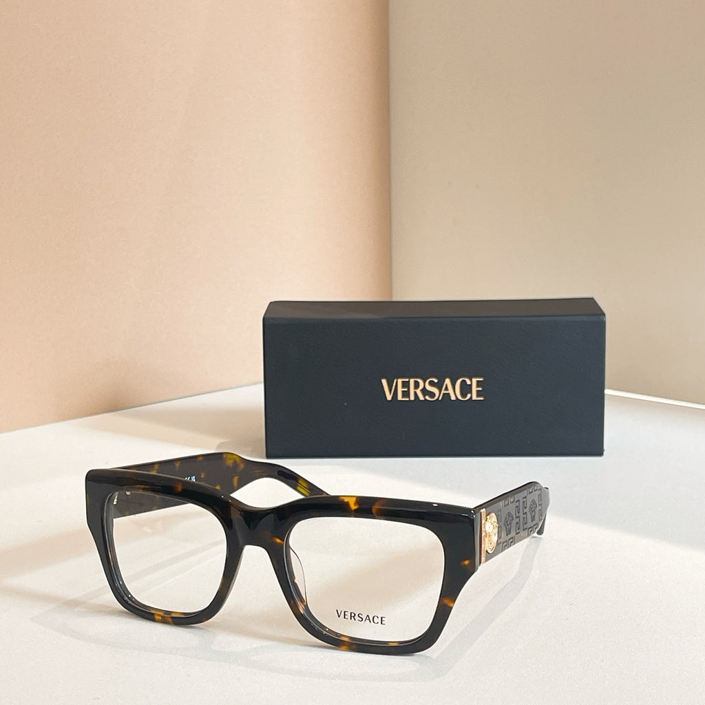 Eyeglasses frame with tortoise pattern and clear lenses, with Versace logo box