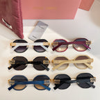 MiuMiu sunglasses set with assorted frame colors in a neat row