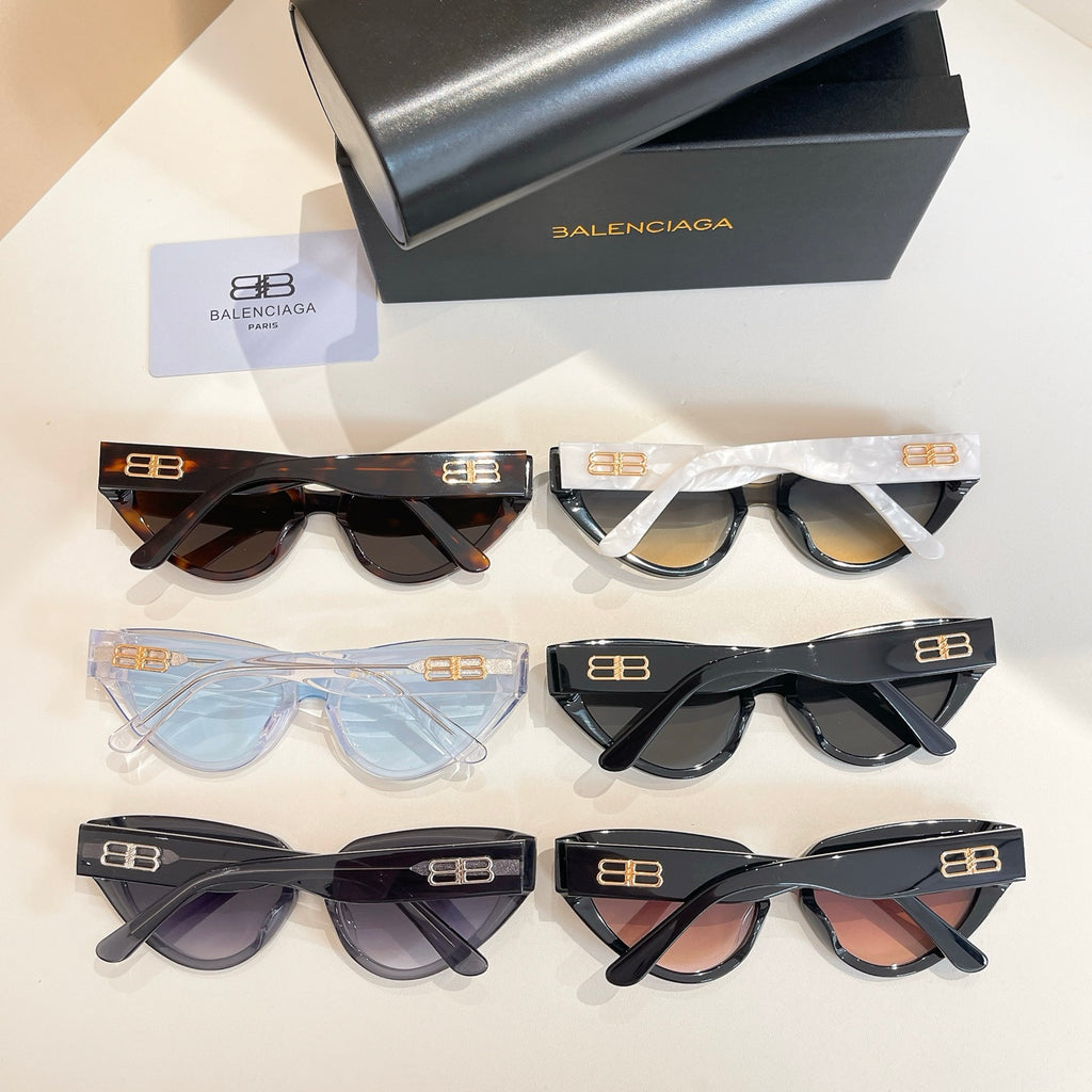 Balenciaga sunglasses set with multiple frames: black, light-blue, and translucent styles
