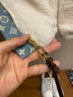Blue monogram trim with gold snap and faux leather pull tabs