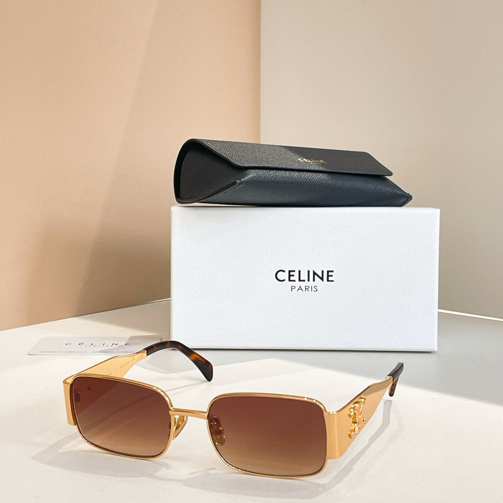 Sunglasses with amber lenses and gold square frames