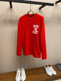 Red knit sweater with white Louis Vuitton monogram chest logo