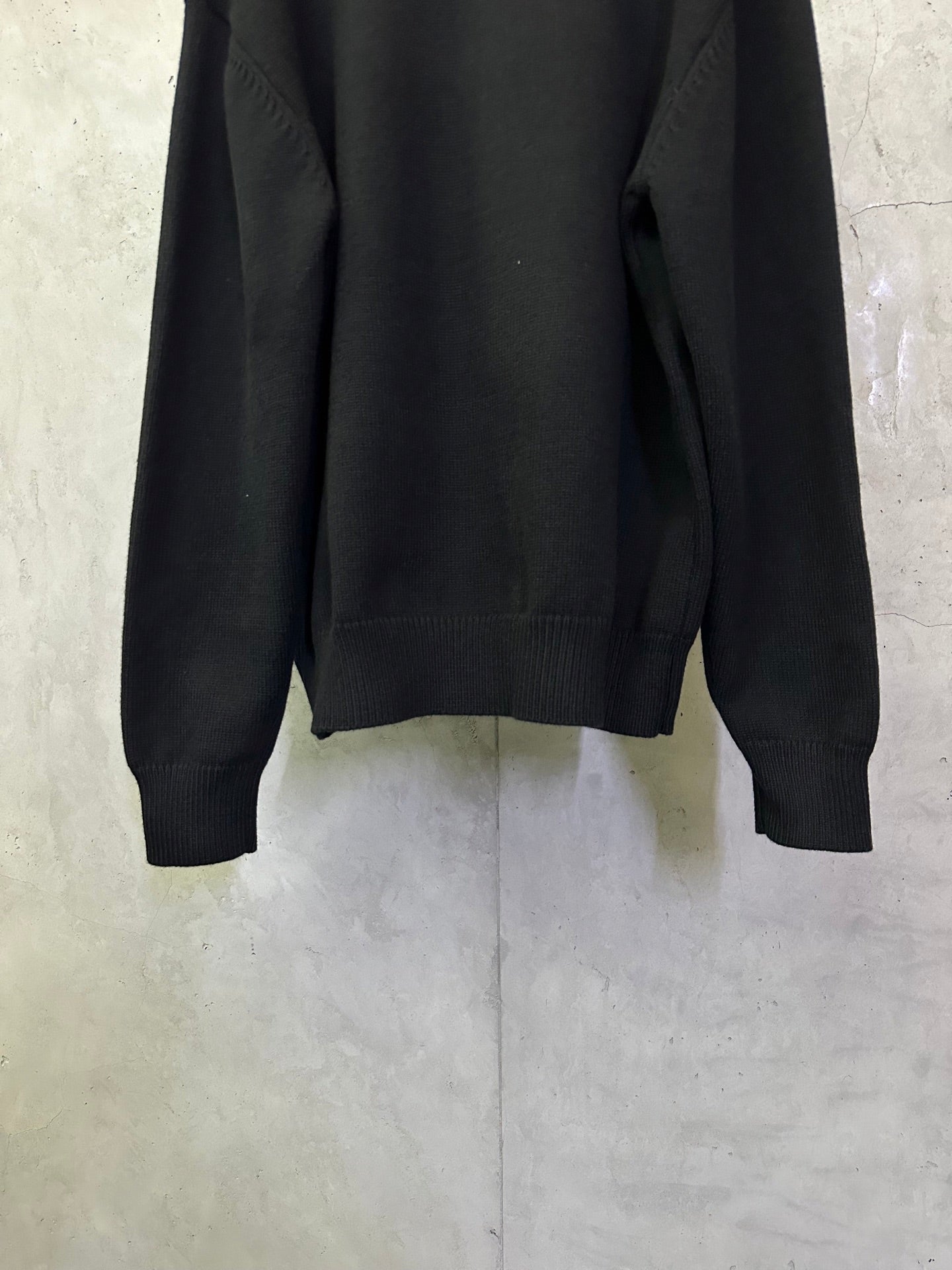 Fendi black knit sweater back view with ribbed hem and cuffs